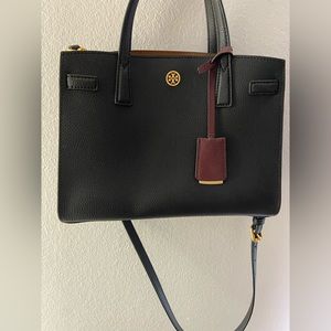 Black Tory Burch tote with maroon tag
